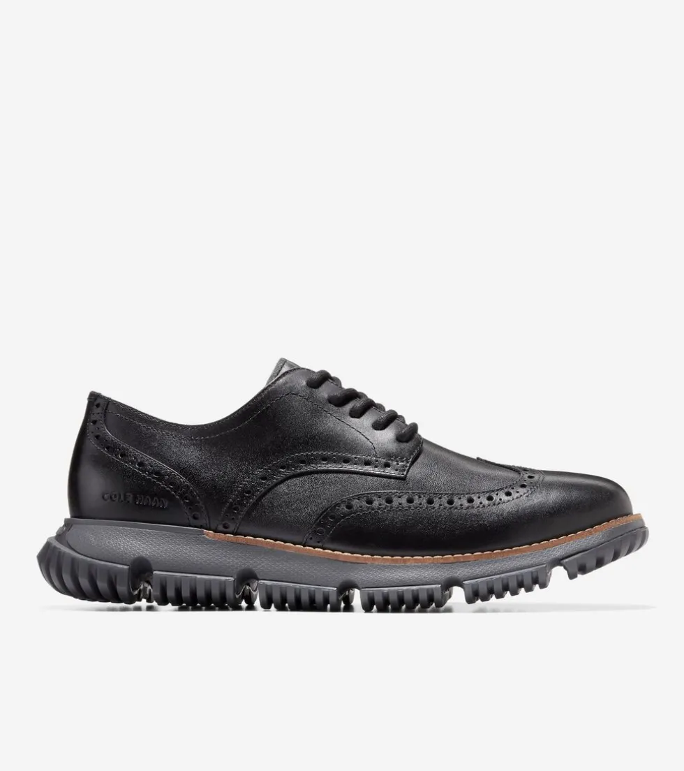 mens-4zeroslashgrand-wingtip-w-NetITKUH-0.webp Sale Cole Haan Men's 4.ZERØGRAND Wingtip Winter Oxfords Black-GrayPinstripe