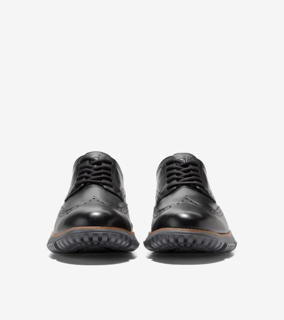mens-4zeroslashgrand-wingtip-w-NetITKUH-1.webp Sale Cole Haan Men's 4.ZERØGRAND Wingtip Winter Oxfords Black-GrayPinstripe