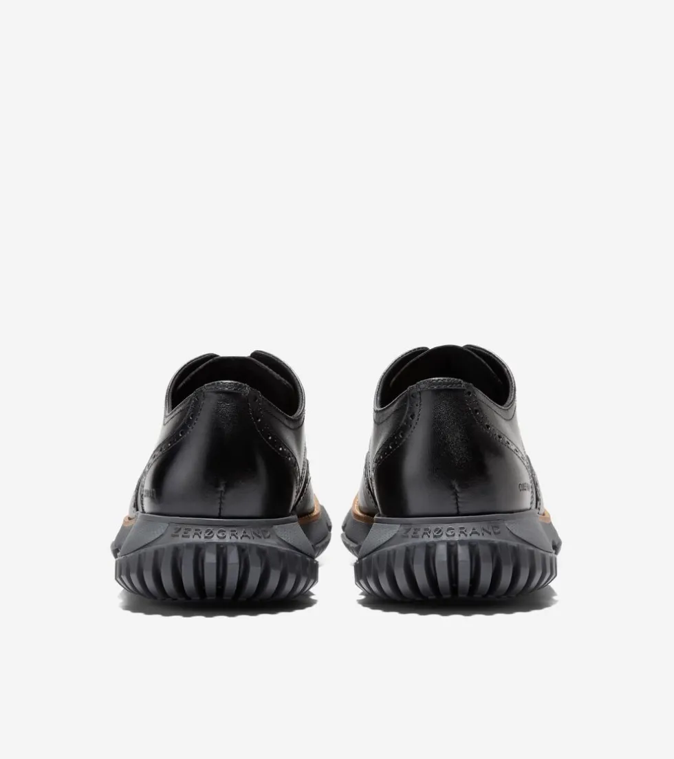 mens-4zeroslashgrand-wingtip-w-NetITKUH-2.webp Sale Cole Haan Men's 4.ZERØGRAND Wingtip Winter Oxfords Black-GrayPinstripe